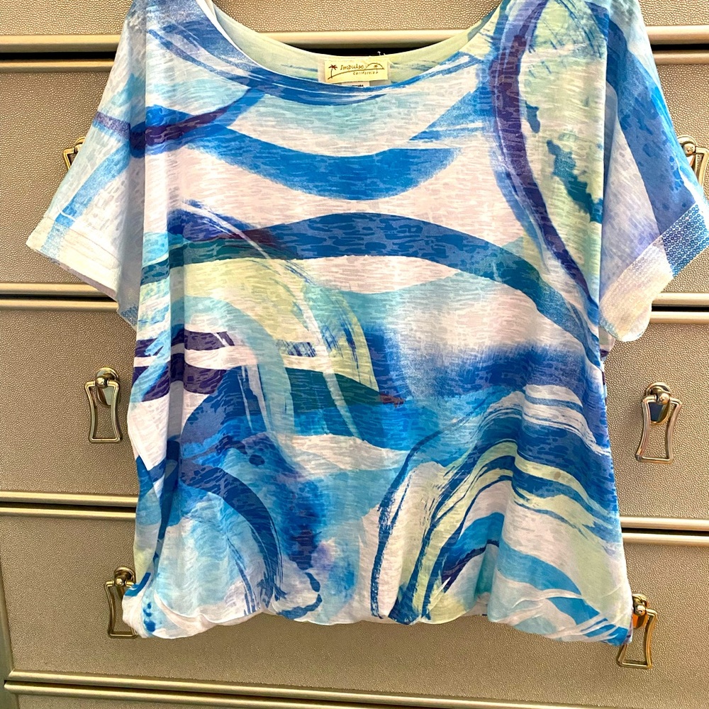 Stylish and breezy blouse with open back and sequins on sleeve size M
